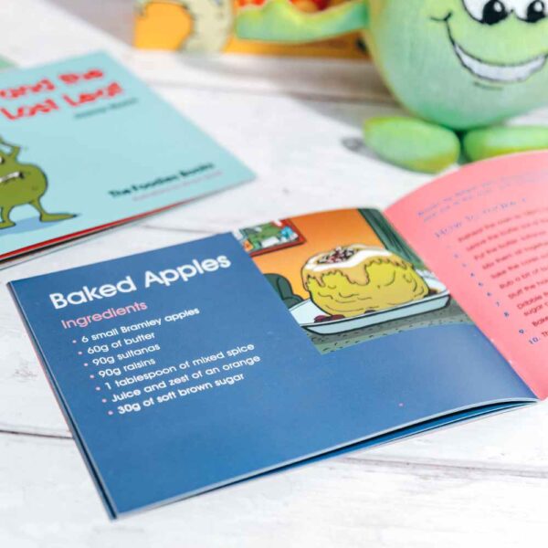 An image of an open book of Apple And The Copycat – The Foodies veggie patch story for December, with the pages open to the children's recipe at the back