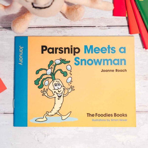 A flatlay image of the book Parsnip Meets A Snowman – The Foodies veggie patch story for January, on a worktop background.